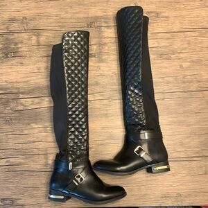 Black patent leathered quilted riding boots with gold/silver buckles